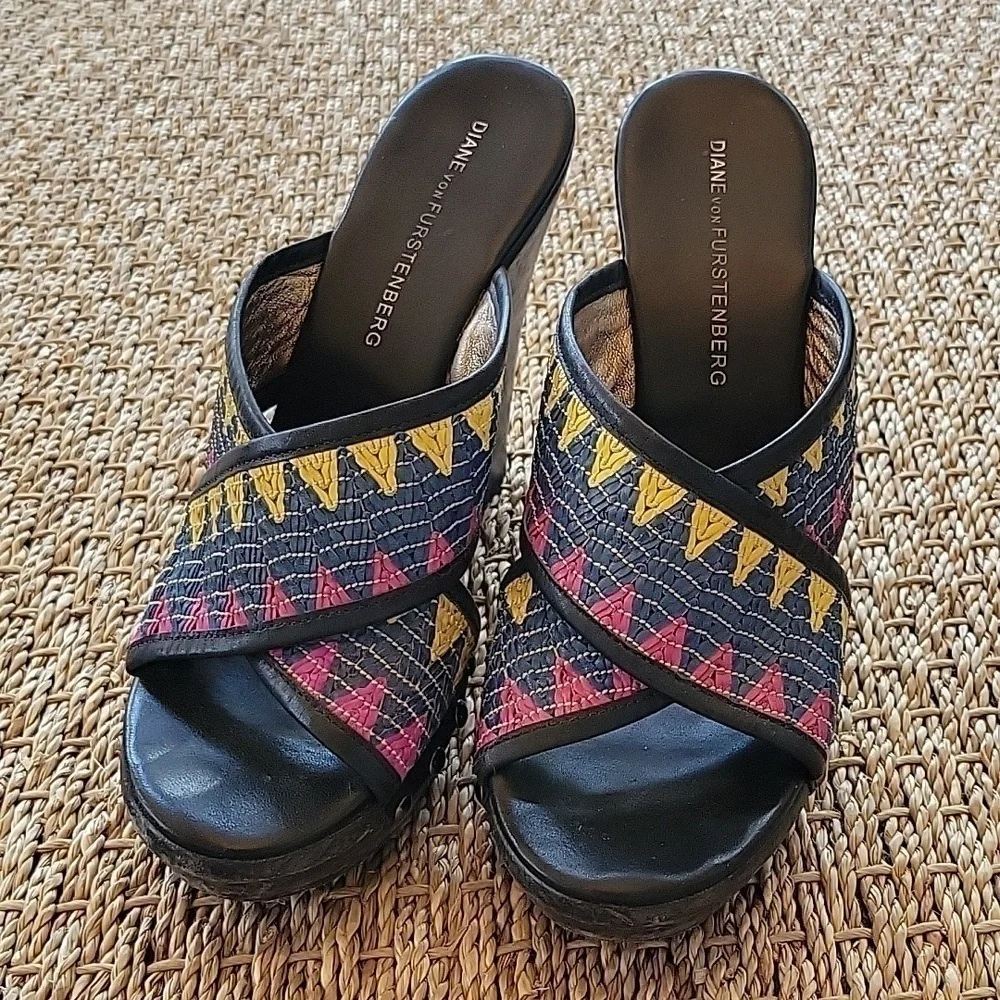 Diane Von Furstenberg wedge sandals. Textile strap, wood heel.